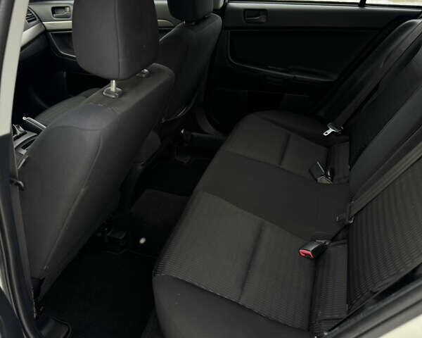 Білий Міцубісі Lancer, об'ємом двигуна 0 л та пробігом 203 тис. км за 6700 $, фото 15 на Automoto.ua