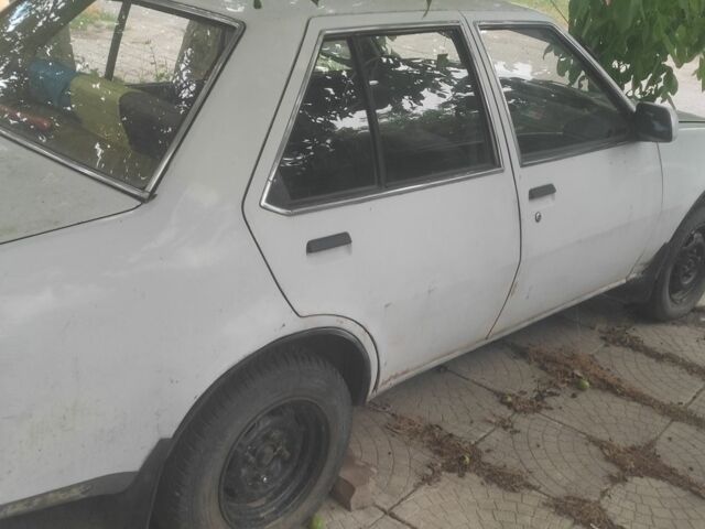 Белый Мицубиси Лансер, объемом двигателя 0 л и пробегом 1000 тыс. км за 334 $, фото 2 на Automoto.ua