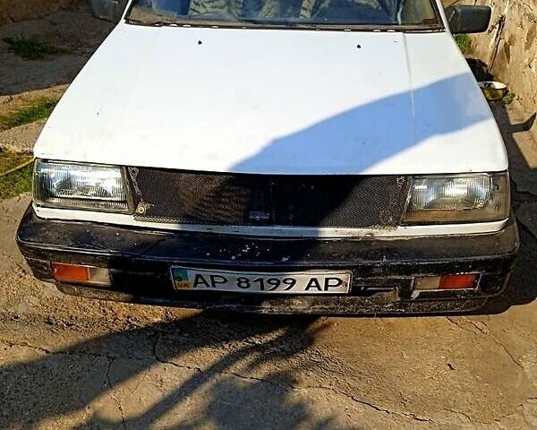 Мицубиси Лансер 1987 в Запорожье на Automoto.ua Белый Мицубиси Лансер, объемом двигателя 1.8 л и пробегом 270 тыс. км за 520 $, фото 1 на Automoto.ua