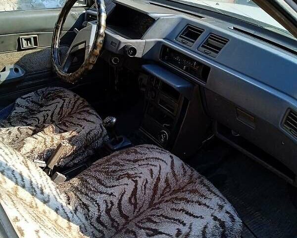 Мицубиси Лансер 1987 в Запорожье на Automoto.ua Белый Мицубиси Лансер, объемом двигателя 1.8 л и пробегом 270 тыс. км за 520 $, фото 5 на Automoto.ua