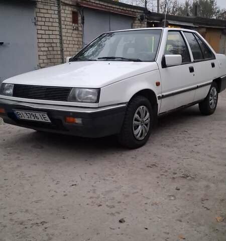 Белый Мицубиси Лансер, объемом двигателя 1.46 л и пробегом 250 тыс. км за 1300 $, фото 4 на Automoto.ua