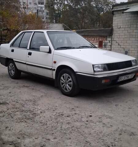 Белый Мицубиси Лансер, объемом двигателя 1.46 л и пробегом 250 тыс. км за 1300 $, фото 3 на Automoto.ua