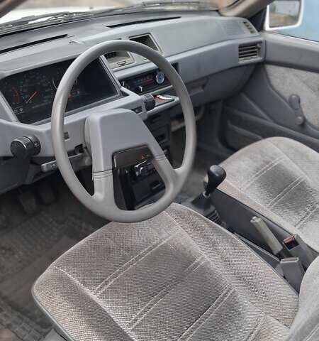 Белый Мицубиси Лансер, объемом двигателя 1.46 л и пробегом 250 тыс. км за 1300 $, фото 5 на Automoto.ua