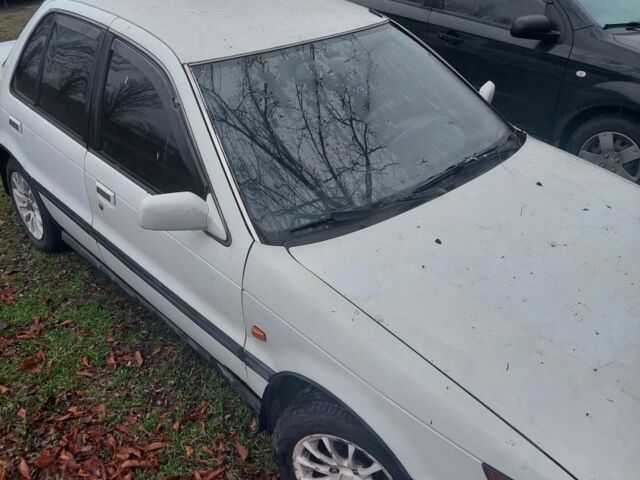 Белый Мицубиси Лансер, объемом двигателя 1.5 л и пробегом 400 тыс. км за 1300 $, фото 2 на Automoto.ua