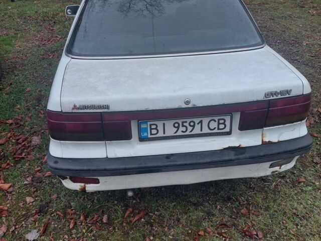 Белый Мицубиси Лансер, объемом двигателя 1.5 л и пробегом 400 тыс. км за 1300 $, фото 4 на Automoto.ua