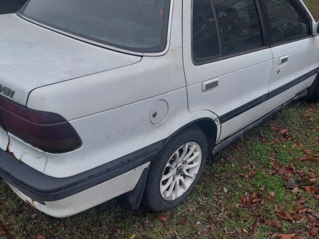 Белый Мицубиси Лансер, объемом двигателя 1.5 л и пробегом 400 тыс. км за 1300 $, фото 3 на Automoto.ua