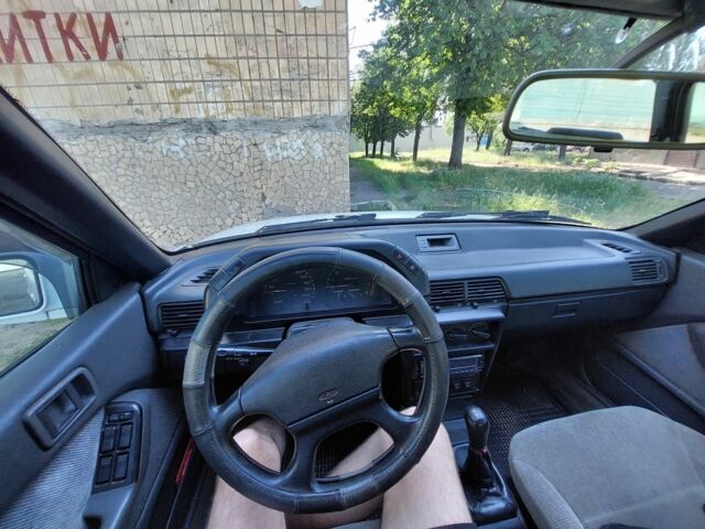 Белый Мицубиси Лансер, объемом двигателя 1.5 л и пробегом 400 тыс. км за 1300 $, фото 5 на Automoto.ua