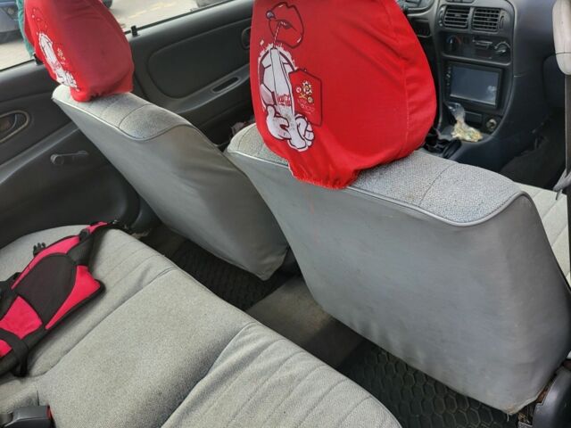 Білий Міцубісі Lancer, об'ємом двигуна 1.3 л та пробігом 280 тис. км за 2750 $, фото 4 на Automoto.ua