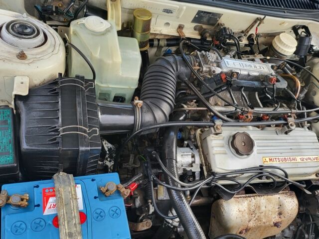 Білий Міцубісі Lancer, об'ємом двигуна 1.3 л та пробігом 280 тис. км за 2750 $, фото 3 на Automoto.ua