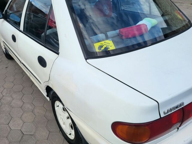 Білий Міцубісі Lancer, об'ємом двигуна 1.3 л та пробігом 280 тис. км за 2750 $, фото 1 на Automoto.ua