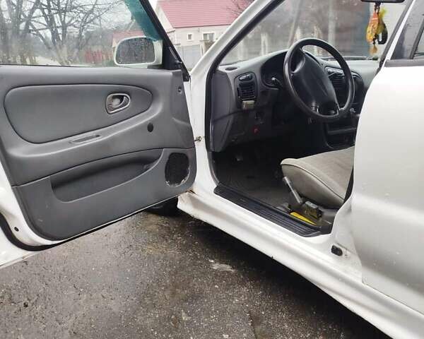 Білий Міцубісі Lancer, об'ємом двигуна 1.3 л та пробігом 300 тис. км за 1700 $, фото 9 на Automoto.ua