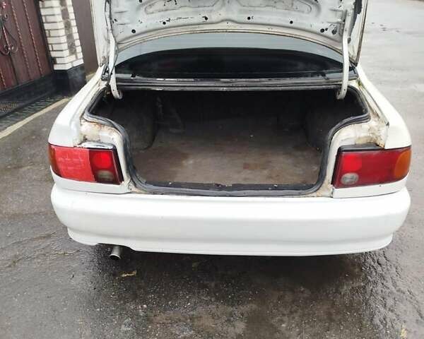 Білий Міцубісі Lancer, об'ємом двигуна 1.3 л та пробігом 300 тис. км за 1700 $, фото 10 на Automoto.ua