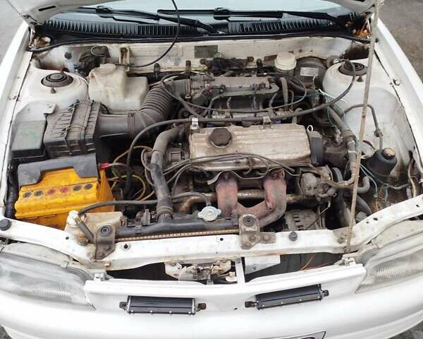 Білий Міцубісі Lancer, об'ємом двигуна 1.3 л та пробігом 300 тис. км за 1700 $, фото 8 на Automoto.ua