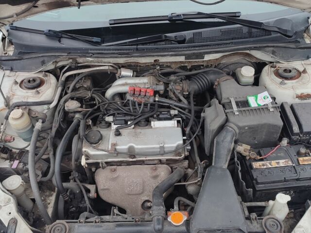 Белый Мицубиси Лансер, объемом двигателя 1.6 л и пробегом 306 тыс. км за 3000 $, фото 17 на Automoto.ua