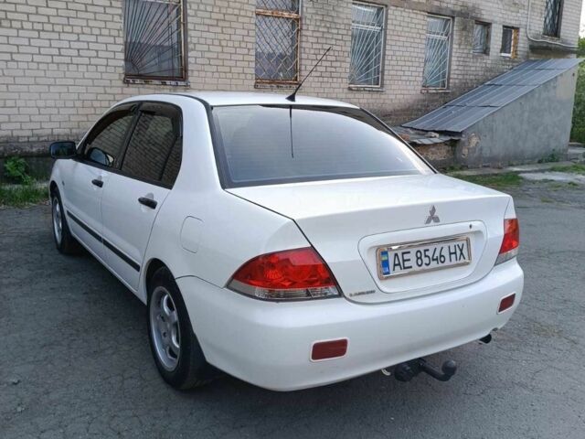 Білий Міцубісі Lancer, об'ємом двигуна 1.6 л та пробігом 198 тис. км за 4463 $, фото 9 на Automoto.ua