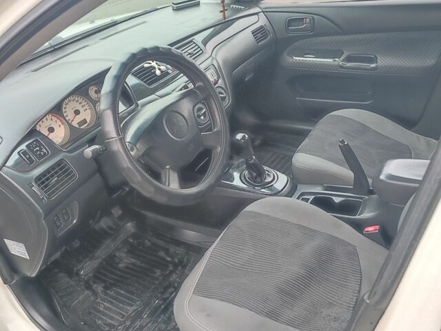 Белый Мицубиси Лансер, объемом двигателя 1.6 л и пробегом 306 тыс. км за 3000 $, фото 13 на Automoto.ua