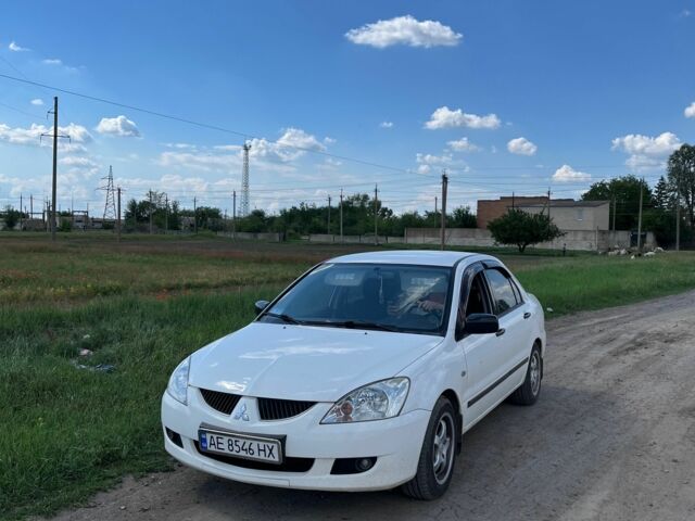 Білий Міцубісі Lancer, об'ємом двигуна 1.6 л та пробігом 198 тис. км за 4463 $, фото 4 на Automoto.ua