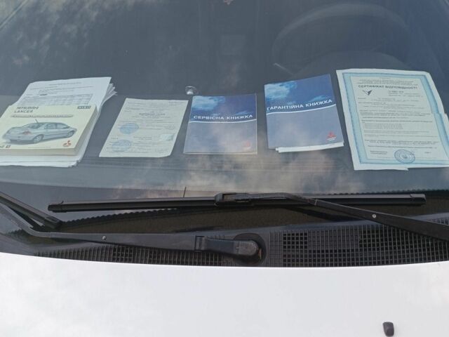 Білий Міцубісі Lancer, об'ємом двигуна 1.6 л та пробігом 198 тис. км за 4463 $, фото 13 на Automoto.ua