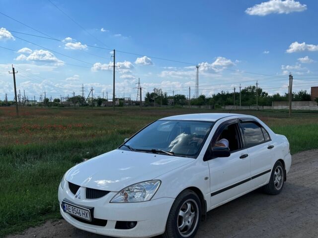 Білий Міцубісі Lancer, об'ємом двигуна 1.6 л та пробігом 198 тис. км за 4463 $, фото 5 на Automoto.ua