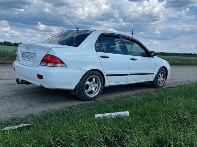 Білий Міцубісі Lancer, об'ємом двигуна 1.6 л та пробігом 198 тис. км за 4463 $, фото 1 на Automoto.ua
