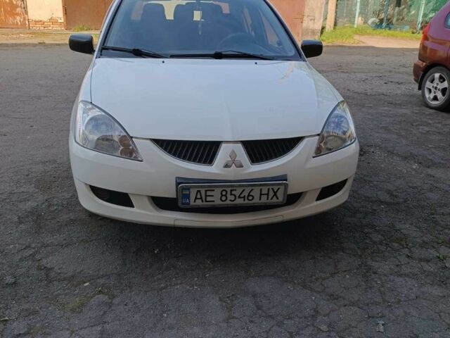 Білий Міцубісі Lancer, об'ємом двигуна 1.6 л та пробігом 198 тис. км за 4463 $, фото 14 на Automoto.ua