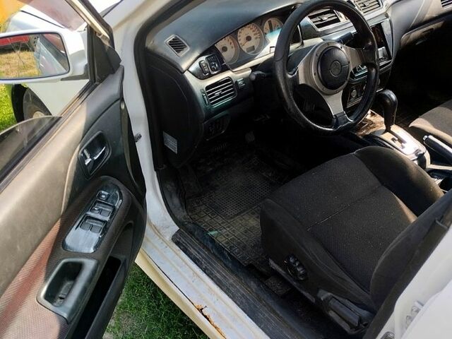 Білий Міцубісі Lancer, об'ємом двигуна 2 л та пробігом 200 тис. км за 1950 $, фото 4 на Automoto.ua