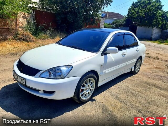 Белый Мицубиси Лансер, объемом двигателя 1.6 л и пробегом 296 тыс. км за 3500 $, фото 3 на Automoto.ua