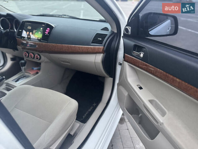 Белый Мицубиси Лансер, объемом двигателя 1.5 л и пробегом 314 тыс. км за 6500 $, фото 19 на Automoto.ua