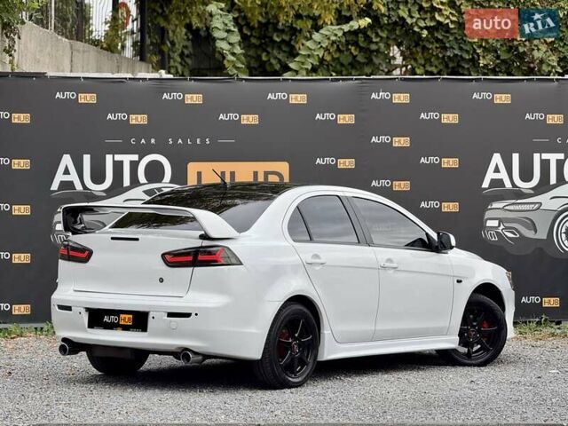 Білий Міцубісі Lancer, об'ємом двигуна 2 л та пробігом 170 тис. км за 6900 $, фото 7 на Automoto.ua