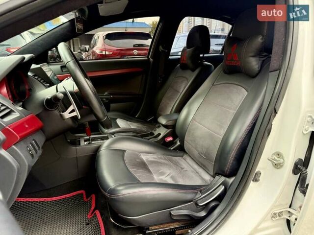 Білий Міцубісі Lancer, об'ємом двигуна 2 л та пробігом 170 тис. км за 6900 $, фото 9 на Automoto.ua