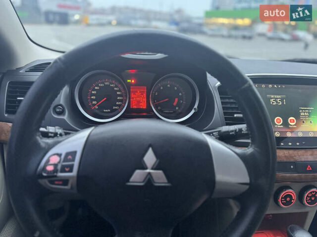 Белый Мицубиси Лансер, объемом двигателя 1.5 л и пробегом 314 тыс. км за 6500 $, фото 23 на Automoto.ua