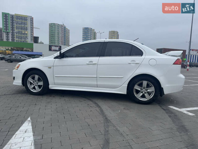 Белый Мицубиси Лансер, объемом двигателя 1.5 л и пробегом 314 тыс. км за 6500 $, фото 6 на Automoto.ua