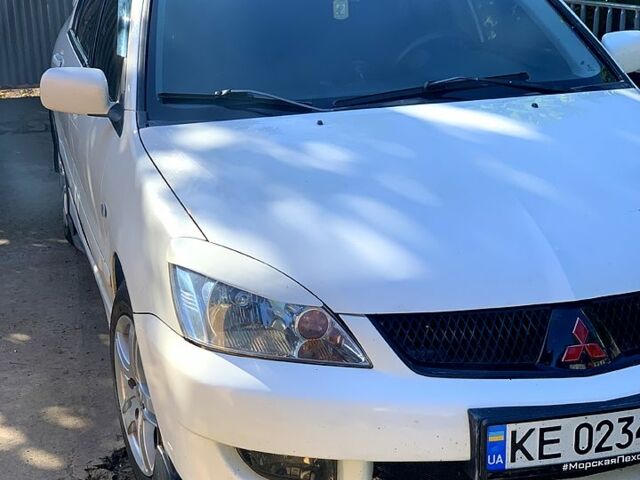 Білий Міцубісі Lancer, об'ємом двигуна 1.6 л та пробігом 250 тис. км за 4700 $, фото 2 на Automoto.ua