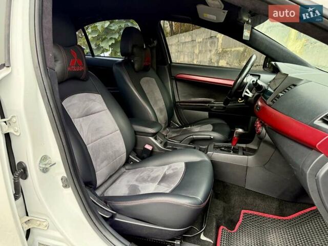 Білий Міцубісі Lancer, об'ємом двигуна 2 л та пробігом 170 тис. км за 6900 $, фото 12 на Automoto.ua