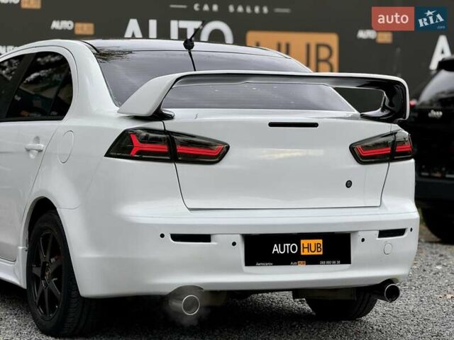 Білий Міцубісі Lancer, об'ємом двигуна 2 л та пробігом 170 тис. км за 6900 $, фото 8 на Automoto.ua