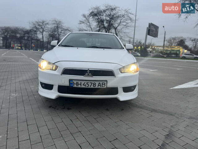 Белый Мицубиси Лансер, объемом двигателя 1.5 л и пробегом 314 тыс. км за 6500 $, фото 7 на Automoto.ua