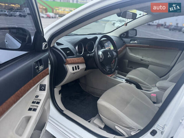 Белый Мицубиси Лансер, объемом двигателя 1.5 л и пробегом 314 тыс. км за 6500 $, фото 20 на Automoto.ua