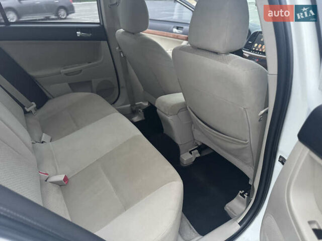 Белый Мицубиси Лансер, объемом двигателя 1.5 л и пробегом 314 тыс. км за 6500 $, фото 16 на Automoto.ua