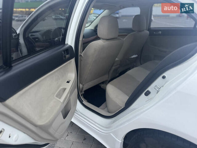 Белый Мицубиси Лансер, объемом двигателя 1.5 л и пробегом 314 тыс. км за 6500 $, фото 12 на Automoto.ua