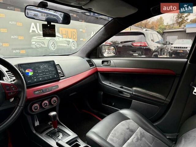 Білий Міцубісі Lancer, об'ємом двигуна 2 л та пробігом 170 тис. км за 6900 $, фото 15 на Automoto.ua