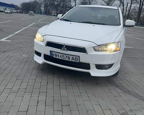Белый Мицубиси Лансер, объемом двигателя 1.5 л и пробегом 314 тыс. км за 6500 $, фото 2 на Automoto.ua
