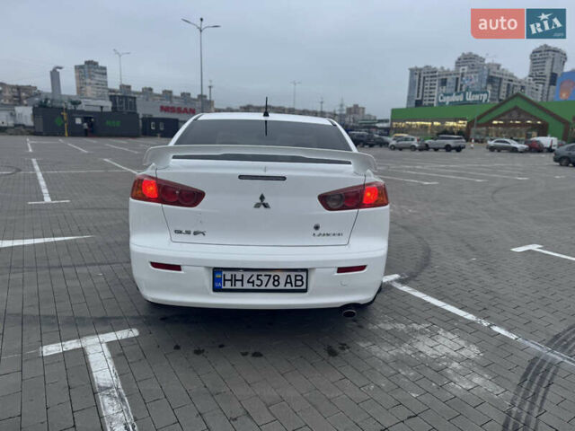 Белый Мицубиси Лансер, объемом двигателя 1.5 л и пробегом 314 тыс. км за 6500 $, фото 9 на Automoto.ua