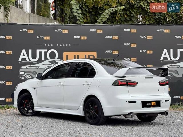 Білий Міцубісі Lancer, об'ємом двигуна 2 л та пробігом 170 тис. км за 6900 $, фото 5 на Automoto.ua