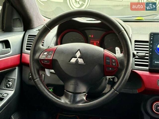 Білий Міцубісі Lancer, об'ємом двигуна 2 л та пробігом 170 тис. км за 6900 $, фото 16 на Automoto.ua