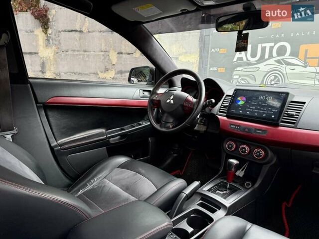 Білий Міцубісі Lancer, об'ємом двигуна 2 л та пробігом 170 тис. км за 6900 $, фото 13 на Automoto.ua