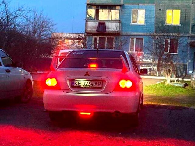 Білий Міцубісі Lancer, об'ємом двигуна 1.6 л та пробігом 250 тис. км за 4700 $, фото 5 на Automoto.ua