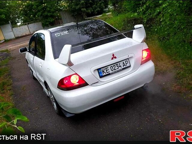 Білий Міцубісі Lancer, об'ємом двигуна 1.6 л та пробігом 250 тис. км за 4700 $, фото 1 на Automoto.ua
