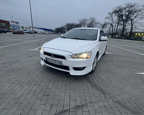 Белый Мицубиси Лансер, объемом двигателя 1.5 л и пробегом 314 тыс. км за 6500 $, фото 1 на Automoto.ua
