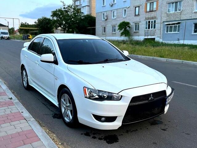 Білий Міцубісі Lancer, об'ємом двигуна 2 л та пробігом 200 тис. км за 7500 $, фото 5 на Automoto.ua