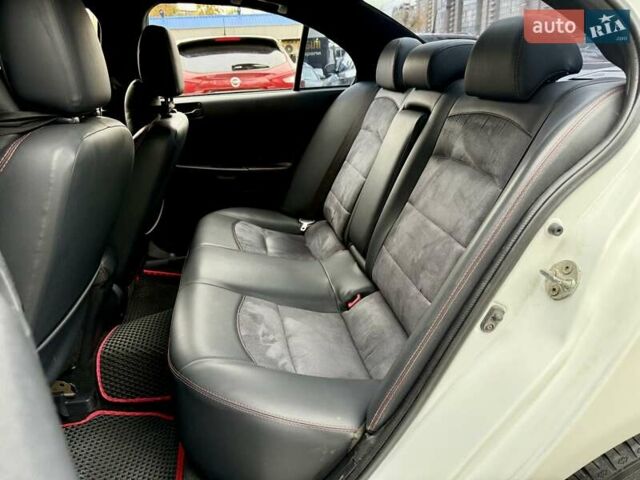 Білий Міцубісі Lancer, об'ємом двигуна 2 л та пробігом 170 тис. км за 6900 $, фото 10 на Automoto.ua